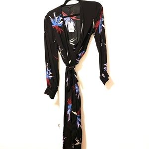 YAYA women’s wrap dress. Black with floral detailing. Buttons at wrist.